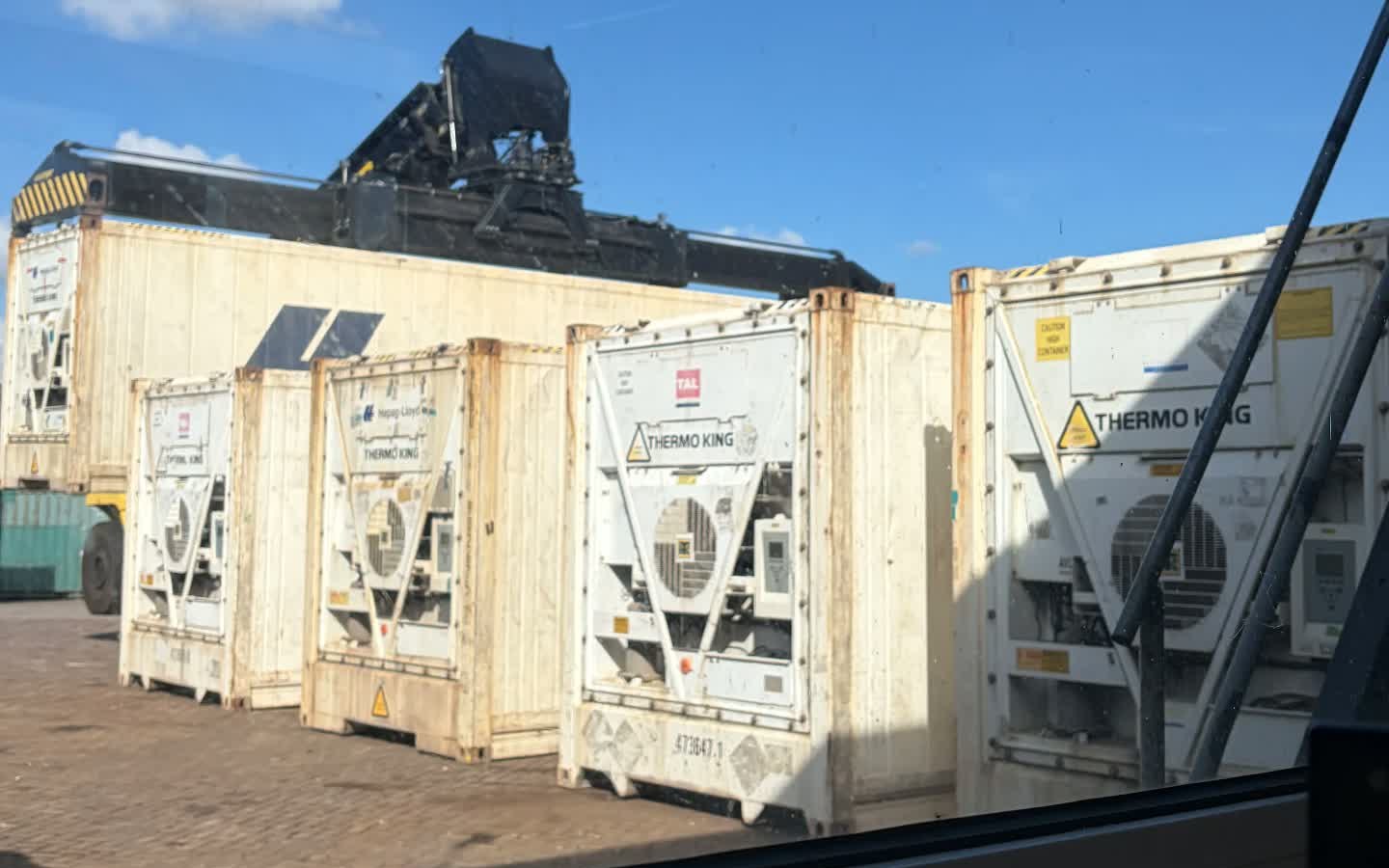 Row of reefer containers with Thermo King cooling units at the DCS depot